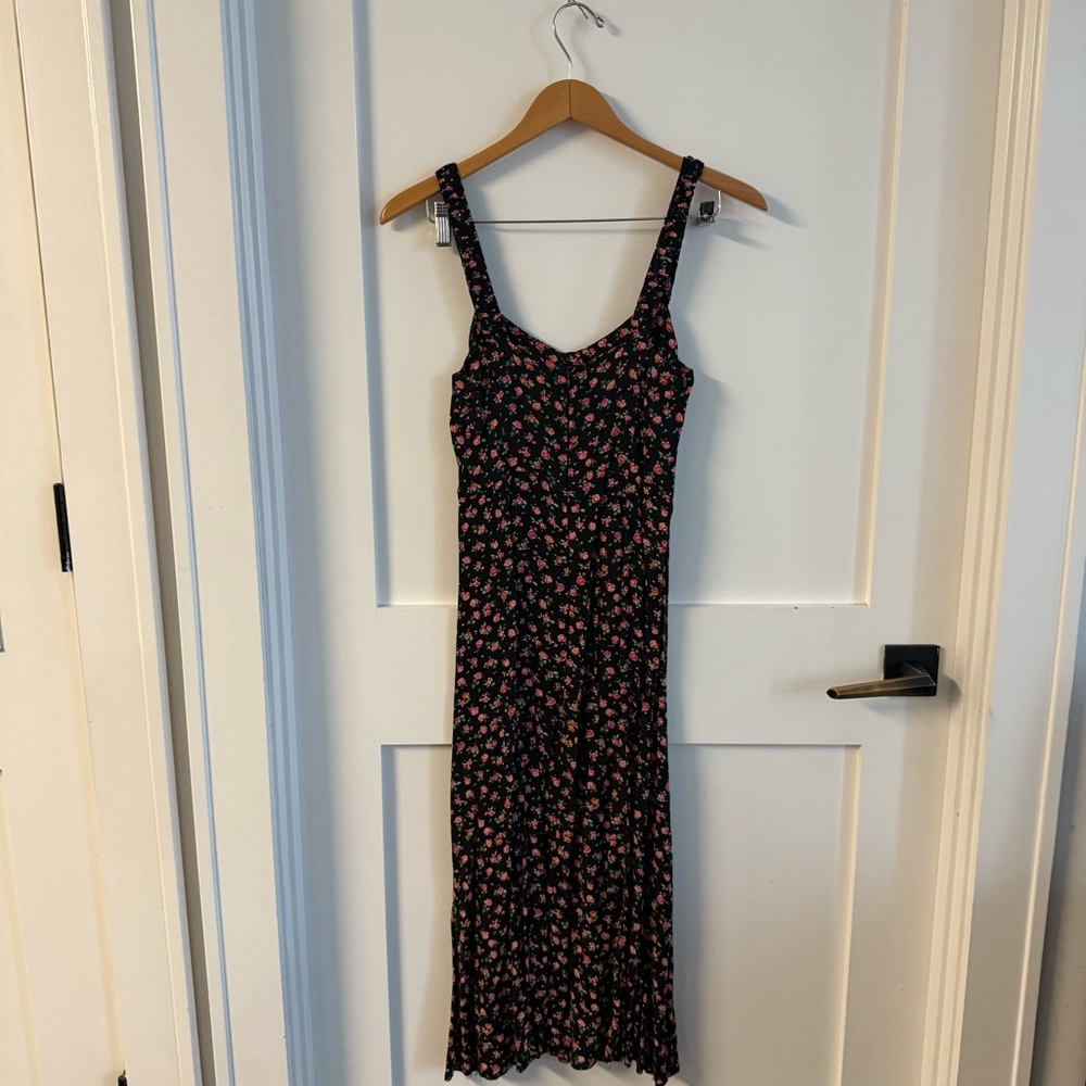 Black woven midi dress with red floral and bustier seaming detail and front slit